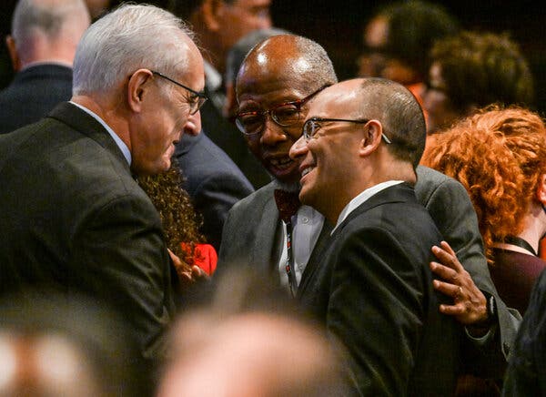 Judge Hector LaSalle, center right, greets other guests at Gov. Kathy Hochul’s inauguration ceremony in Albany on New Year’s Day.
